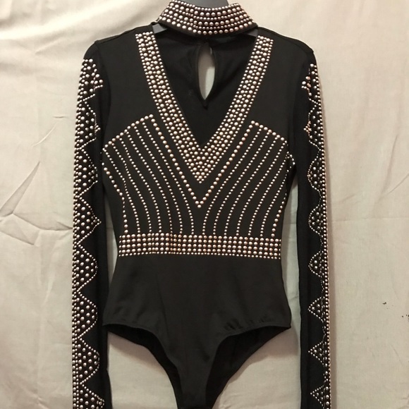 black and gold bodysuit